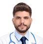 الدكتور علي الطويل الدكتور علي الطويل